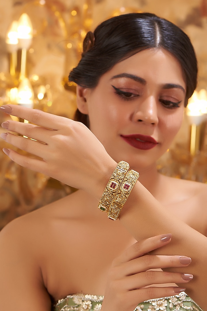 Gold Finish Kundan Polki Temple Bangles (Set Of 2) by VASTRAA Jewellery at Pernia's Pop Up Shop