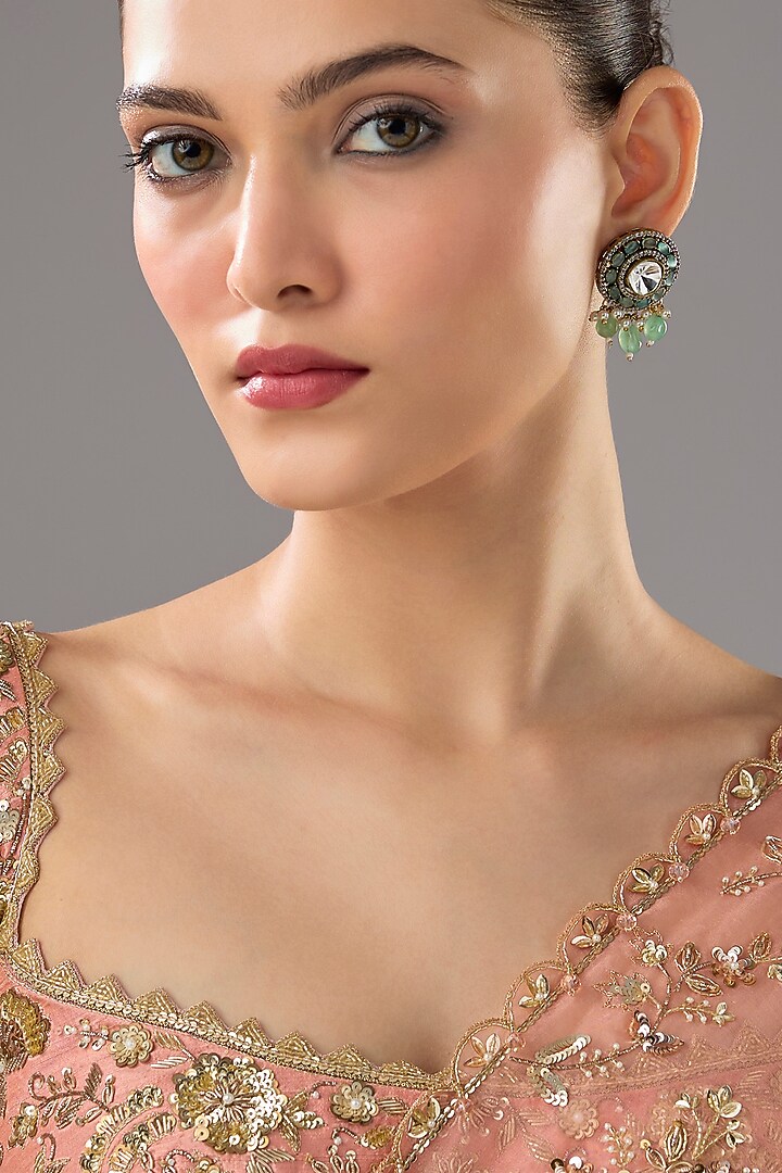 Gold Finish Jade Stone Stud Earrings by VASTRAA Jewellery at Pernia's Pop Up Shop