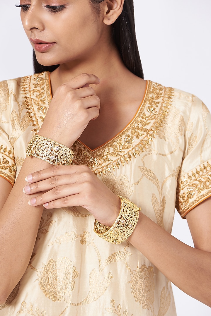 Gold Finish Kundan Polki Bangles (Set of 2) by VASTRAA Jewellery at Pernia's Pop Up Shop