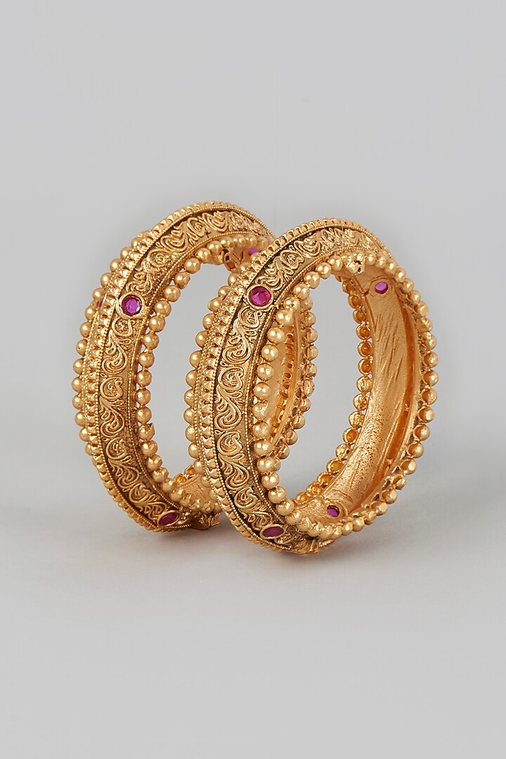 Gold Finish Red Stone Temple Bangles (Set of 2) by VASTRAA Jewellery at Pernia's Pop Up Shop