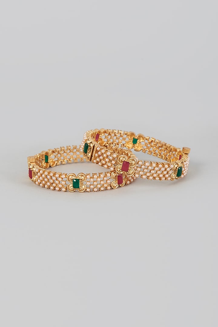 Gold Finish Red & Green Synthetic Stone Bangles (Set of 2) by VASTRAA Jewellery at Pernia's Pop Up Shop