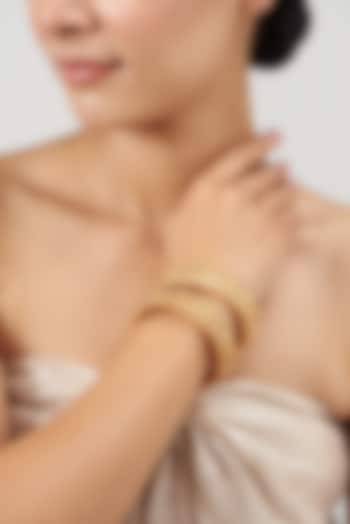 Gold Finish Kundan Polki & Red Synthetic Stone Bangles (Set of 2) by VASTRAA Jewellery at Pernia's Pop Up Shop