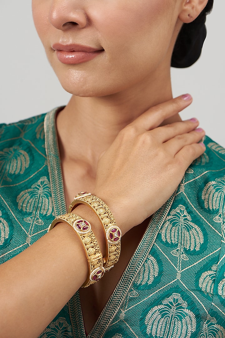 Gold Finish Ruby Synthetic Stone Temple Bangles (Set of 2) by VASTRAA Jewellery at Pernia's Pop Up Shop