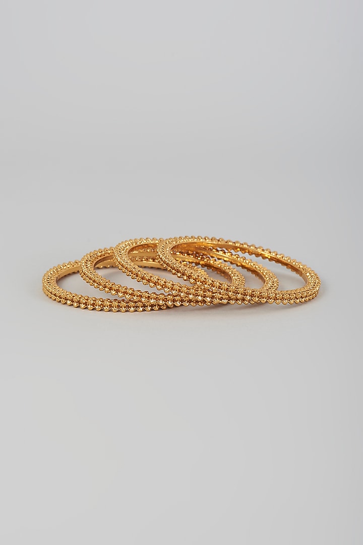 Gold Finish Kundan Polki Temple Bangles (Set Of 4) by VASTRAA Jewellery at Pernia's Pop Up Shop