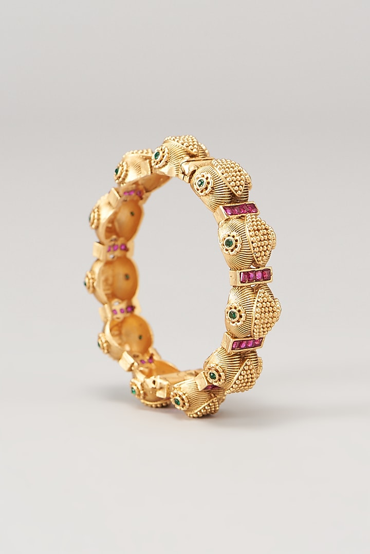 Gold Finish Ruby Synthetic Stone Temple Bangles (Set of 2) by VASTRAA Jewellery at Pernia's Pop Up Shop