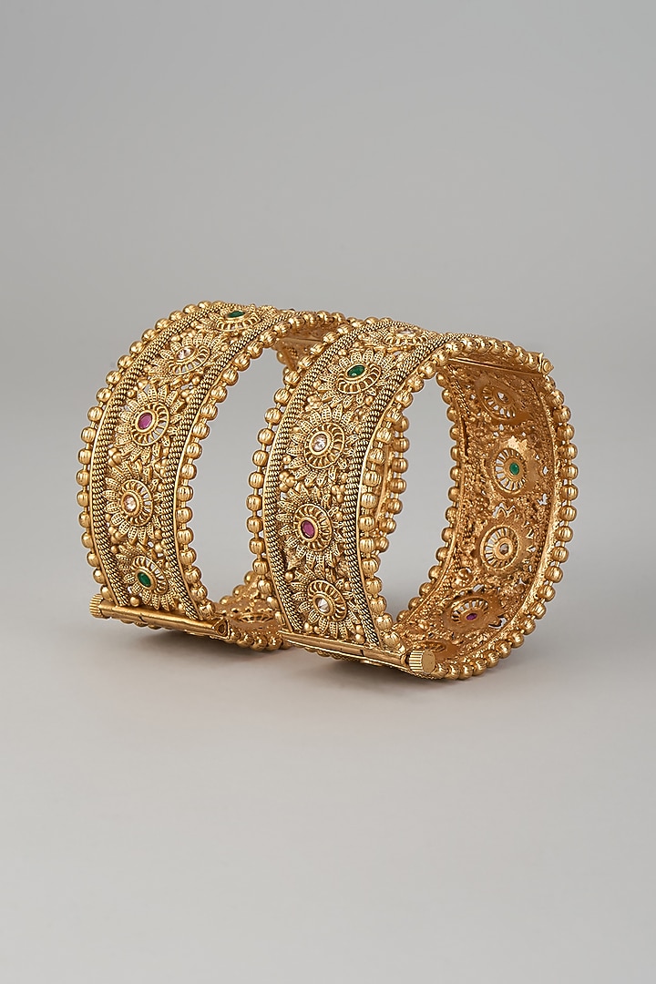 Gold Finish Kundan Polki Temple Bangles (Set of 2) by VASTRAA Jewellery at Pernia's Pop Up Shop
