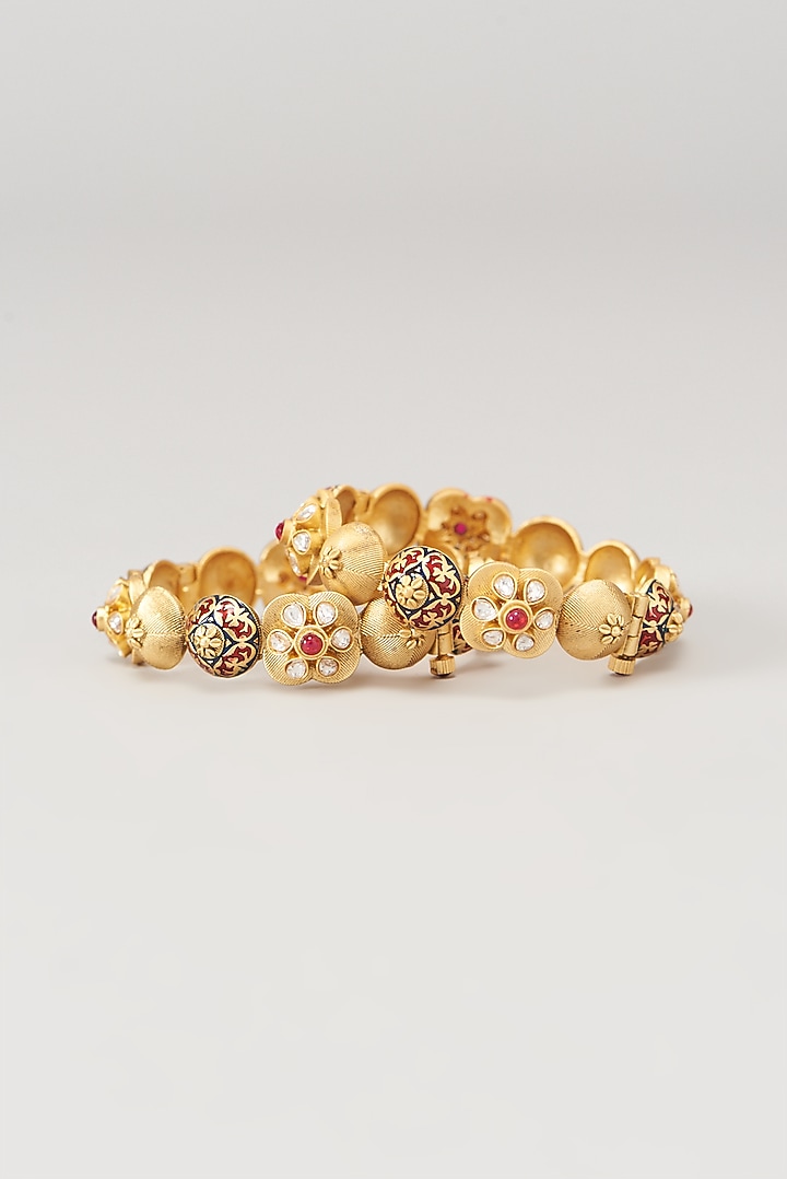 Gold Finish Kundan Polki & Red Stone Enameled Bangles (Set of 2) by VASTRAA Jewellery at Pernia's Pop Up Shop