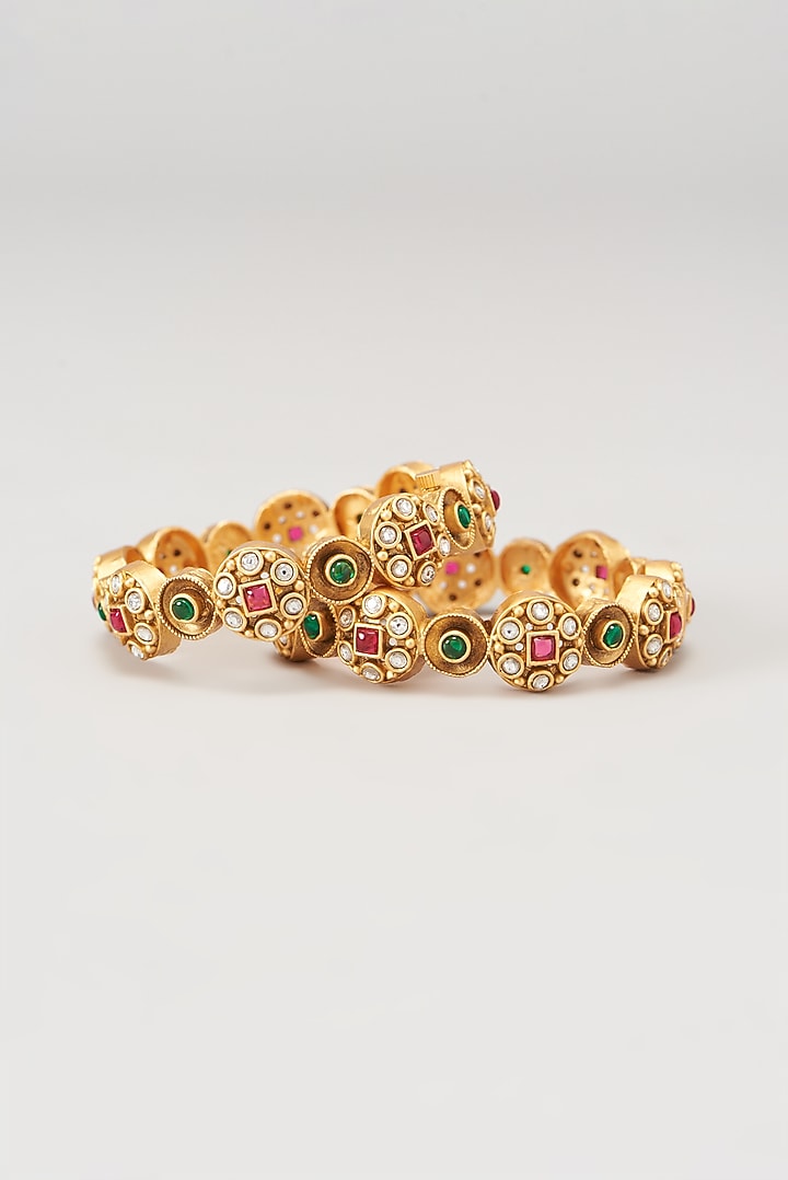 Gold Finish Kundan Polki & Multi-Colored Stone Bangles (Set of 2) by VASTRAA Jewellery at Pernia's Pop Up Shop