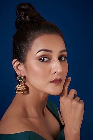 Gold Finish Synthetic Stone Temple Jhumka Earrings by VASTRAA Jewellery