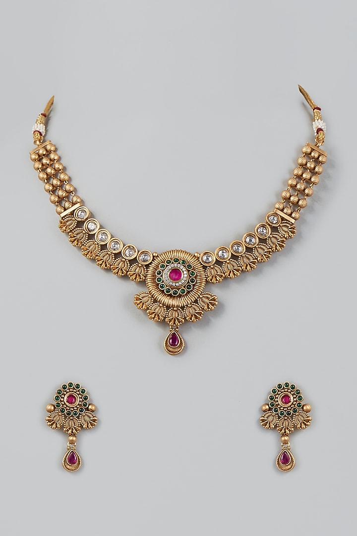 Gold Finish Synthetic Red & Green Stone Temple Necklace Set by VASTRAA Jewellery at Pernia's Pop Up Shop