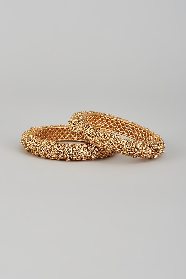 Gold Finish Kundan Polki Temple Bangles (Set of 2) by VASTRAA Jewellery at Pernia's Pop Up Shop