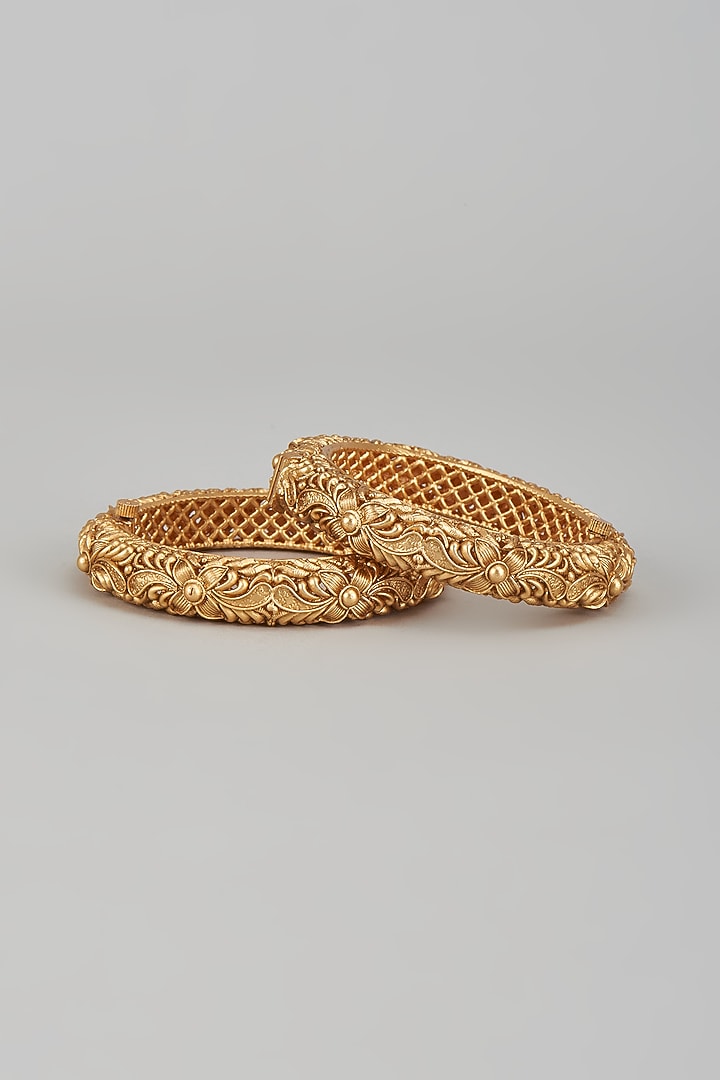 Gold Finish Kundan Polki Temple Bangles (Set of 2) by VASTRAA Jewellery at Pernia's Pop Up Shop
