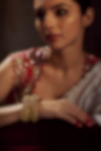 Gold Finish Kundan Polki Temple Bangles (Set of 2) by VASTRAA Jewellery at Pernia's Pop Up Shop