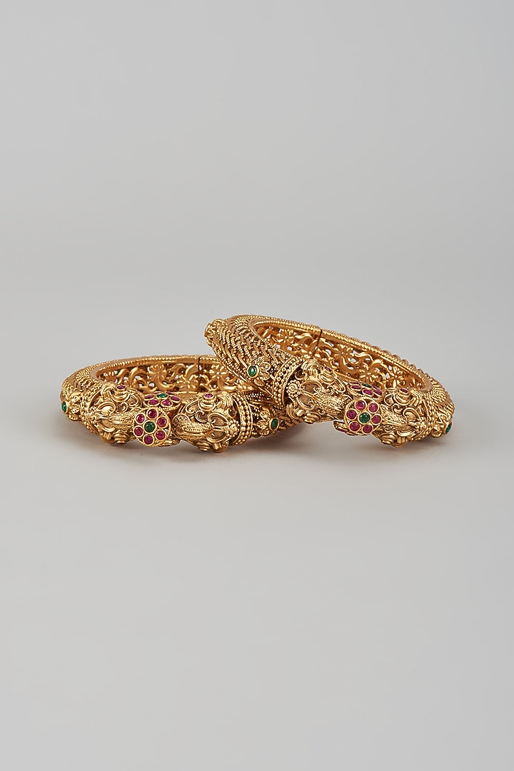 Gold Finish Kundan Polki & Multi-Colored Stone Temple Bangles (Set of 2) by VASTRAA Jewellery at Pernia's Pop Up Shop