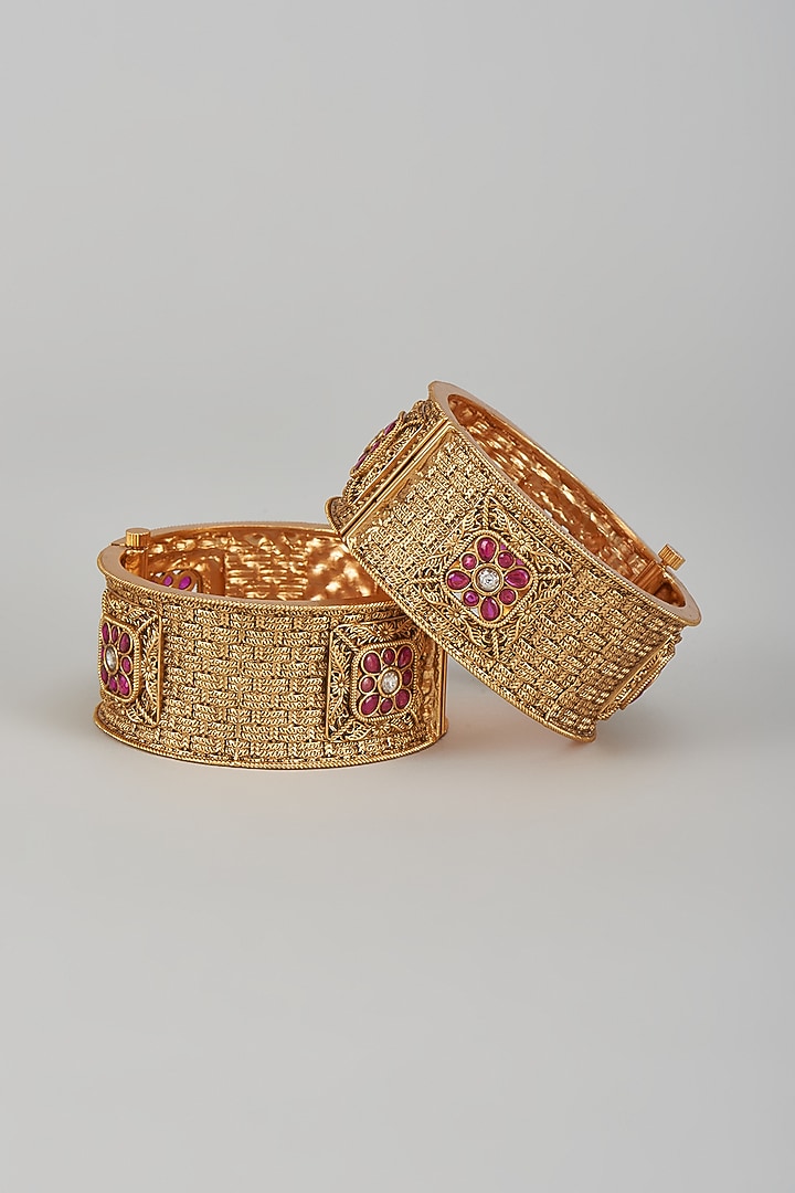 Gold Finish Kundan Polki & Multi-Colored Stone Temple Bangles (Set of 2) by VASTRAA Jewellery at Pernia's Pop Up Shop