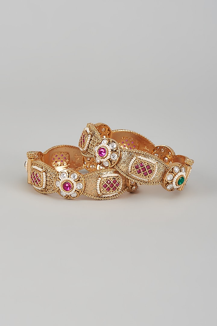 Gold Finish Kundan Polki & Multi-Colored Stone Temple Bangles (Set of 2) by VASTRAA Jewellery at Pernia's Pop Up Shop