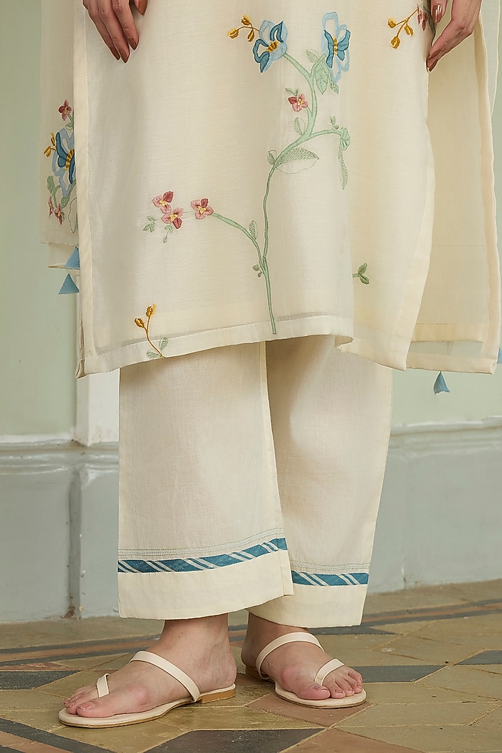 Ivory Muslin Cotton Applique Embroidered Kurta Set by Vaayu at Pernia's Pop Up Shop