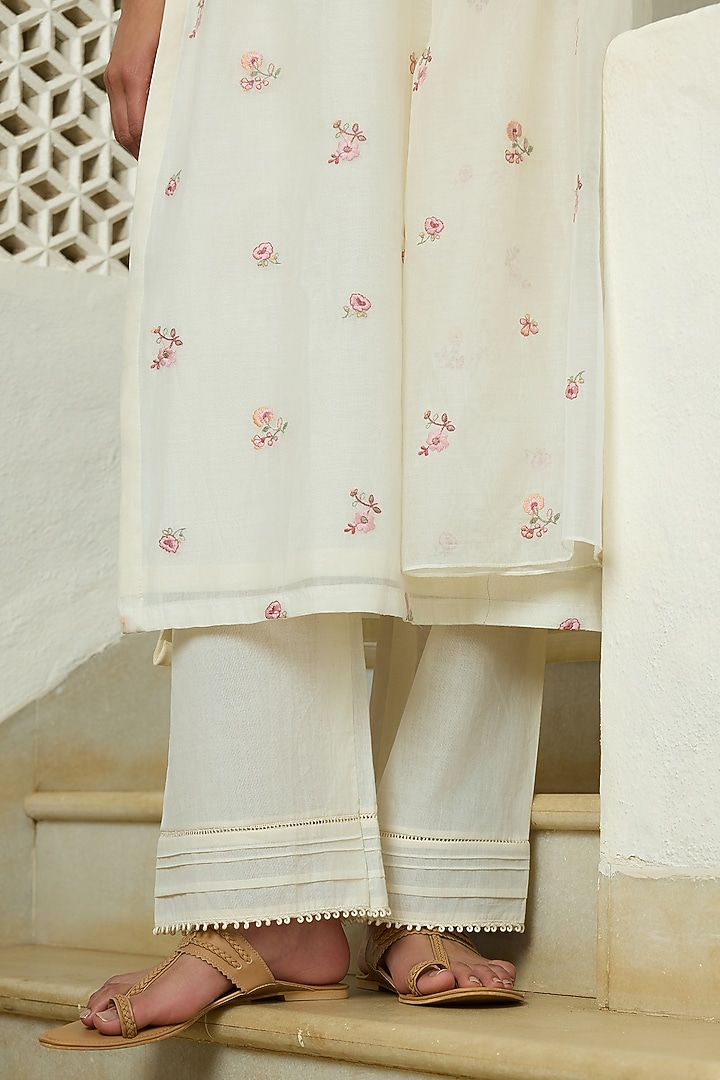 Ivory Muslin Cotton Floral Embroidered Kurta Set by Vaayu at Pernia's Pop Up Shop