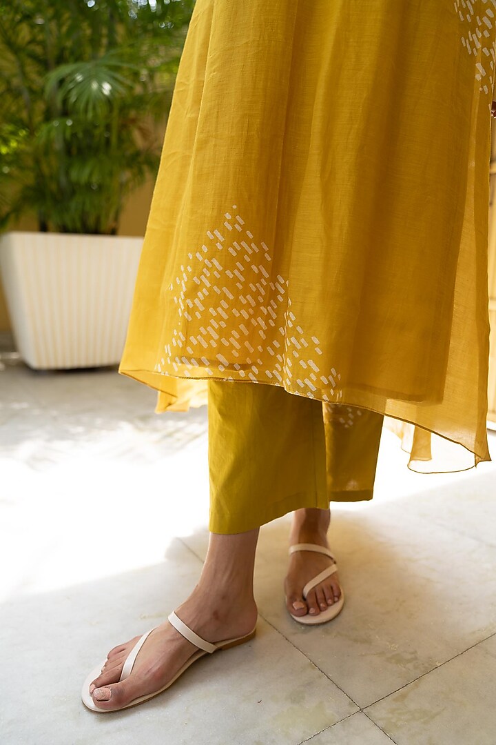 Marigold Printed Asymmetrical Kurta Set by Vaayu at Pernia's Pop Up Shop