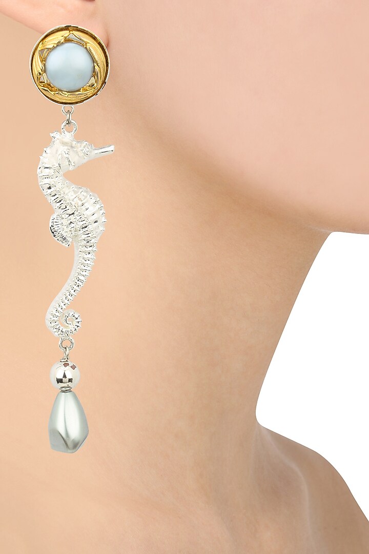 Rhodium finish blue top sea horse earrings available only at Pernia's Pop Up Shop.