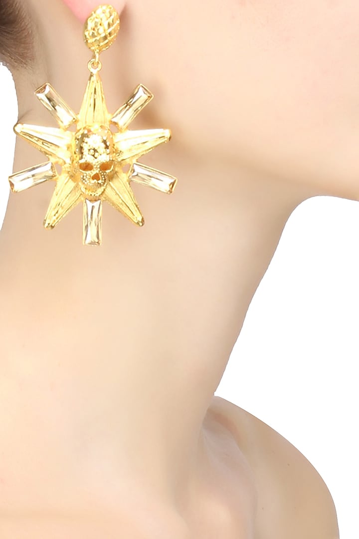 Gold finish semi precious stone skull star shape earrings by Valliyan By Nitya Arora