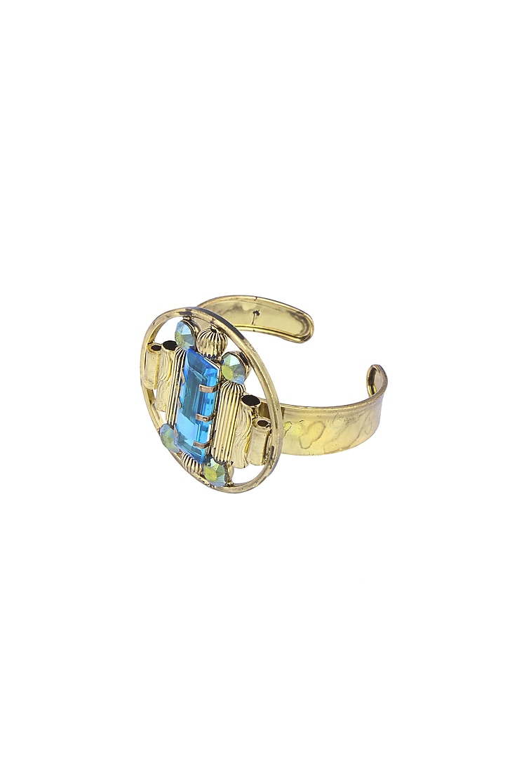 Gold finish semi precious stone round motif cuff available only at Pernia's Pop Up Shop.