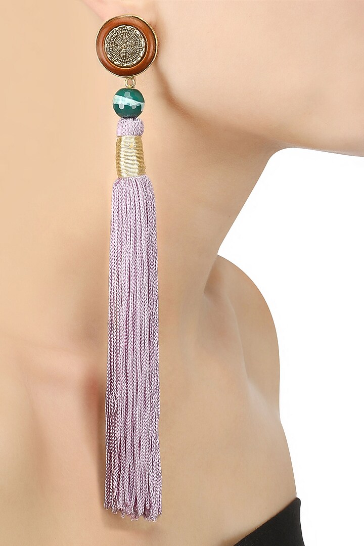Valliyan by Nitya Arora presents Gold plated lilac silk long tassel earrings available only at Pernia's Pop Up Shop.