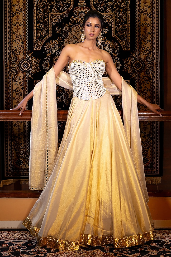 Champagne Gold Tissue Mirror Embellished Wedding Lehenga Set by VANA ETHNICS at Pernia's Pop Up Shop