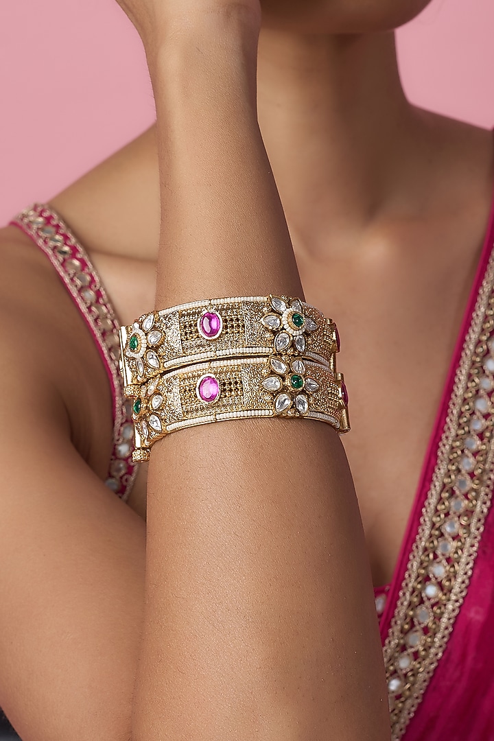Gold Finish Kundan Polki & Multi-Colored Stone Temple Bangles (Set Of 2) by VASTRAA Jewellery at Pernia's Pop Up Shop