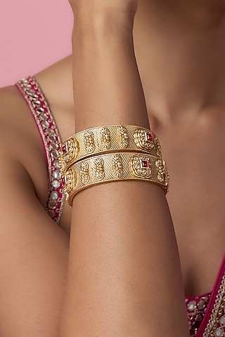 Gold Finish Kundan Polki & Red Stone Temple Bangles (Set Of 2) by VASTRAA Jewellery