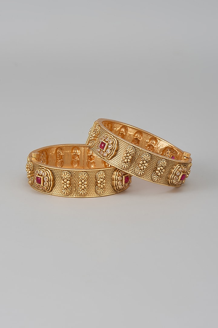 Gold Finish Kundan Polki & Red Stone Temple Bangles (Set Of 2) by VASTRAA Jewellery at Pernia's Pop Up Shop