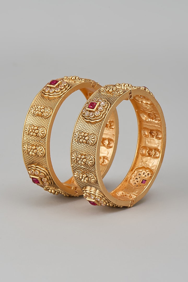 Gold Finish Kundan Polki & Red Stone Temple Bangles (Set Of 2) by VASTRAA Jewellery at Pernia's Pop Up Shop