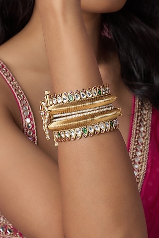 Gold Finish Kundan Polki & Green Stone Temple Bangles (Set Of 2) by VASTRAA Jewellery