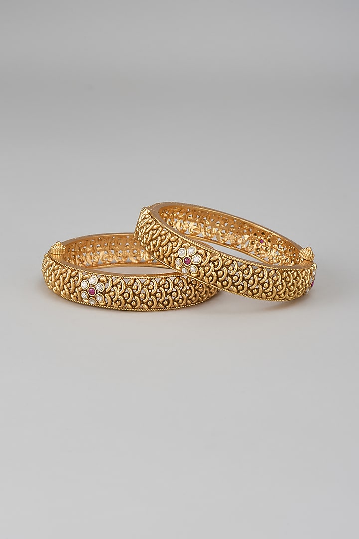 Gold Finish Kundan Polki & Red Stone Temple Bangles (Set Of 2) by VASTRAA Jewellery at Pernia's Pop Up Shop