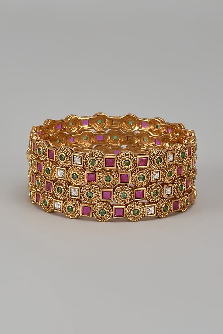 Gold Finish Kundan Polki Temple Bangles (Set Of 4) by VASTRAA Jewellery at Pernia's Pop Up Shop