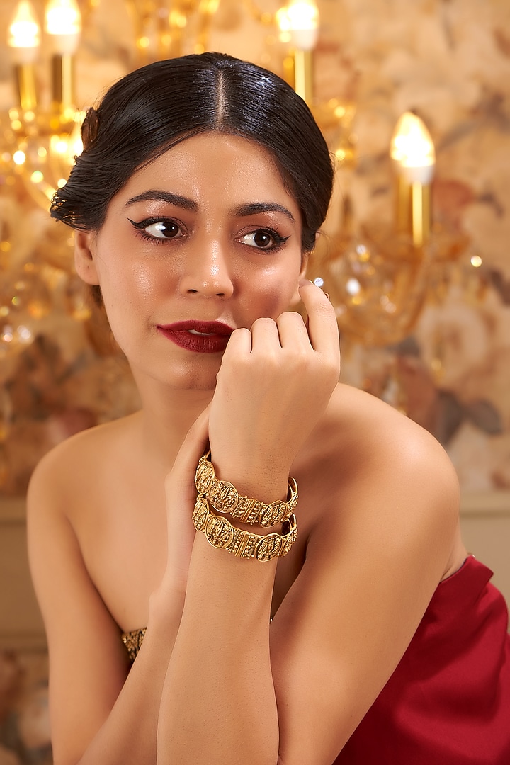 Gold Finish Kundan Polki Temple Bangles (Set Of 2) by VASTRAA Jewellery at Pernia's Pop Up Shop