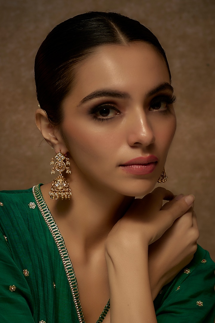 Gold Finish Temple Jhumka Earrings by VASTRAA Jewellery at Pernia's Pop Up Shop