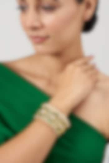 Gold Finish Kundan Polki & Emerald Green Synthetic Stone Bangle by VASTRAA Jewellery at Pernia's Pop Up Shop