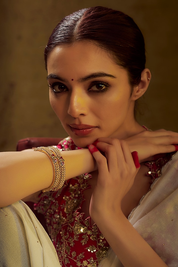 Gold Finish Multi-Colored Stone & Kundan Polki Temple Bangles (Set of 2) by VASTRAA Jewellery at Pernia's Pop Up Shop