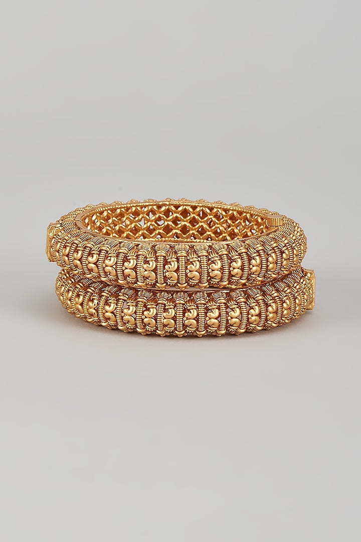 Gold Finish Kundan Polki Temple Bangles (Set of 2) by VASTRAA Jewellery at Pernia's Pop Up Shop