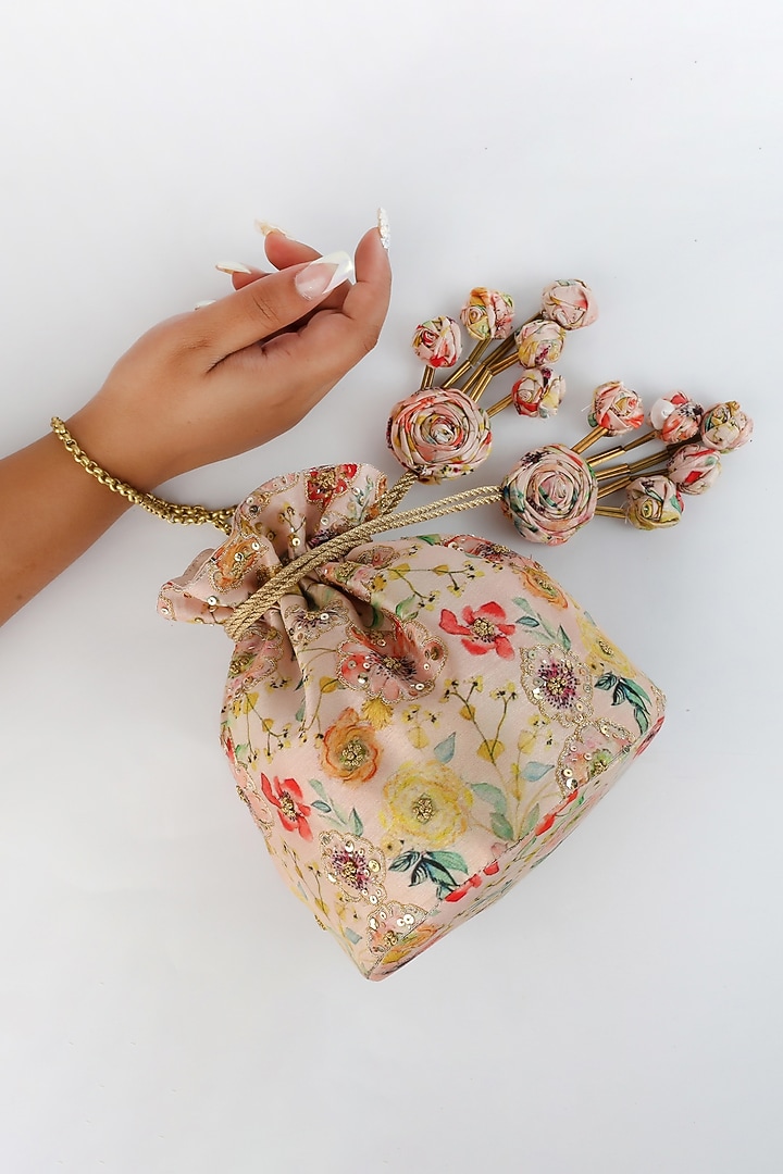 Blush Pink Printed & Embroidered Potli With Handmade Tassels by Vareli Bafna Designs at Pernia's Pop Up Shop