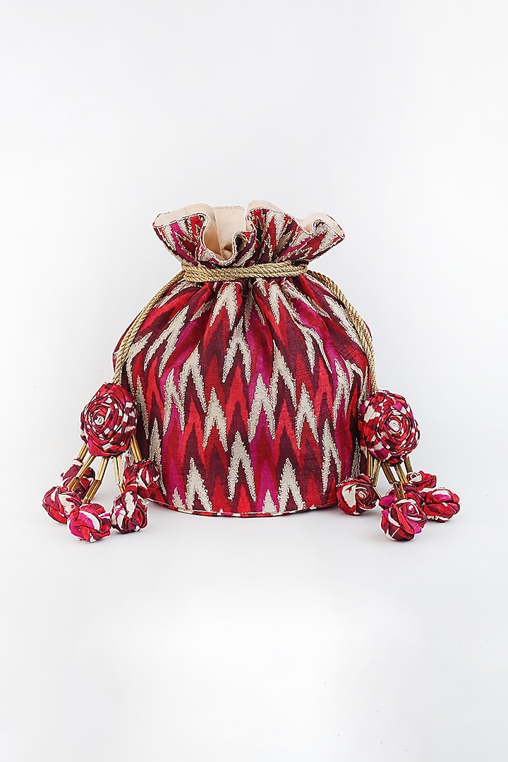 Red Ikat Printed Potli With Handmade Tassels by Vareli Bafna Designs