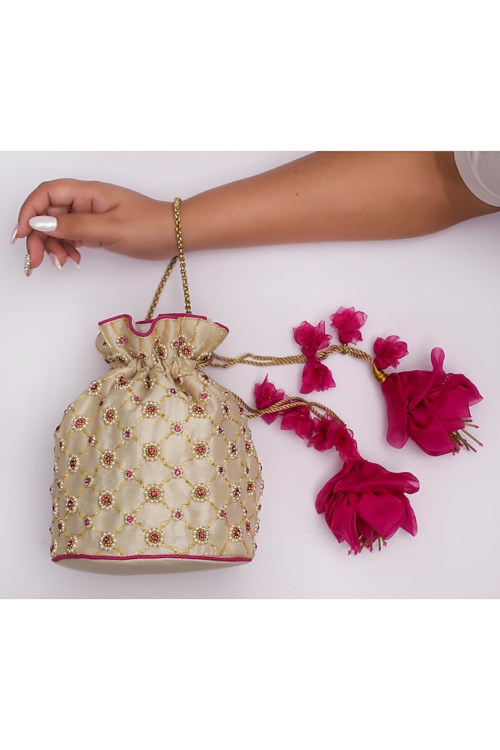 Pearl White Embroidered Potli With Floral Tassels by Vareli Bafna Designs at Pernia's Pop Up Shop