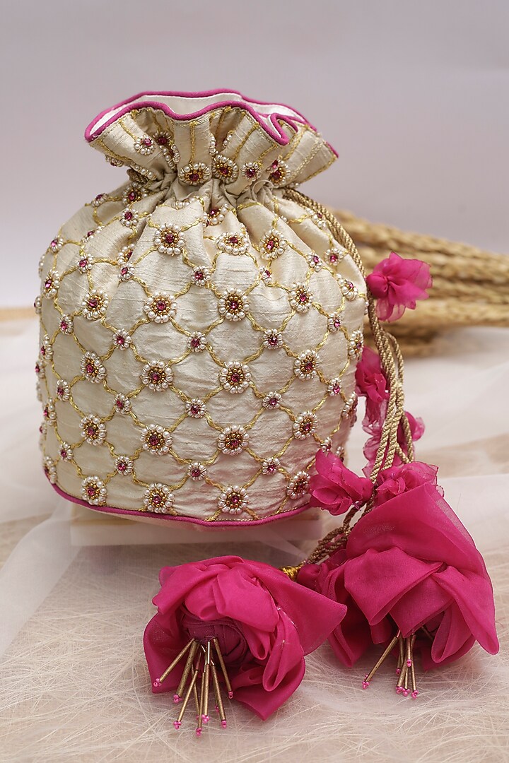 Pearl White Embroidered Potli With Floral Tassels by Vareli Bafna Designs at Pernia's Pop Up Shop