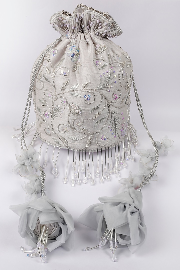Silver Embroidered Potli With Floral Tassels by Vareli Bafna Designs