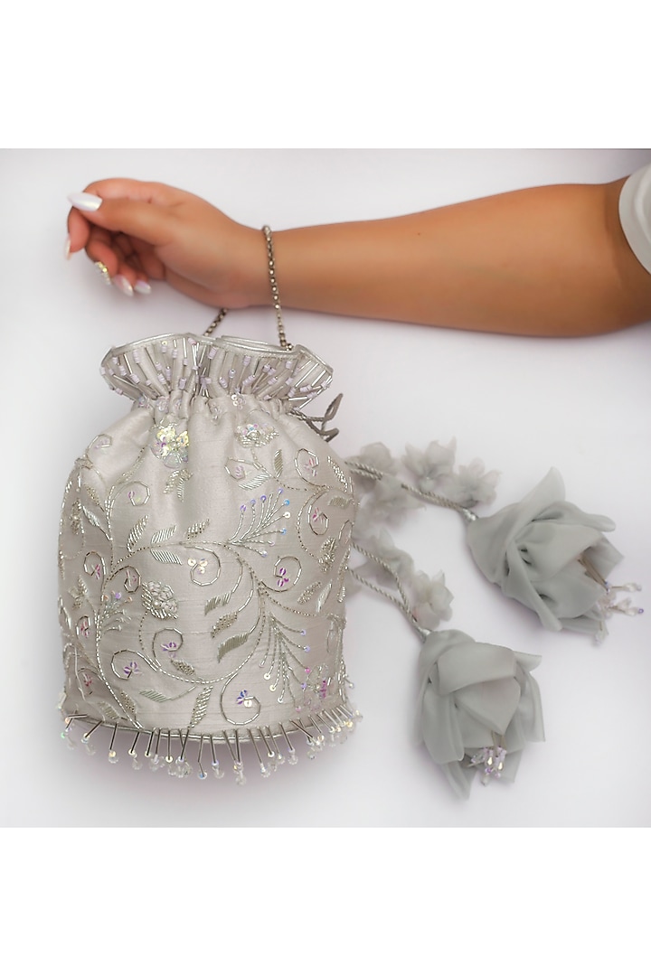 Silver Embroidered Potli With Floral Tassels by Vareli Bafna Designs at Pernia's Pop Up Shop