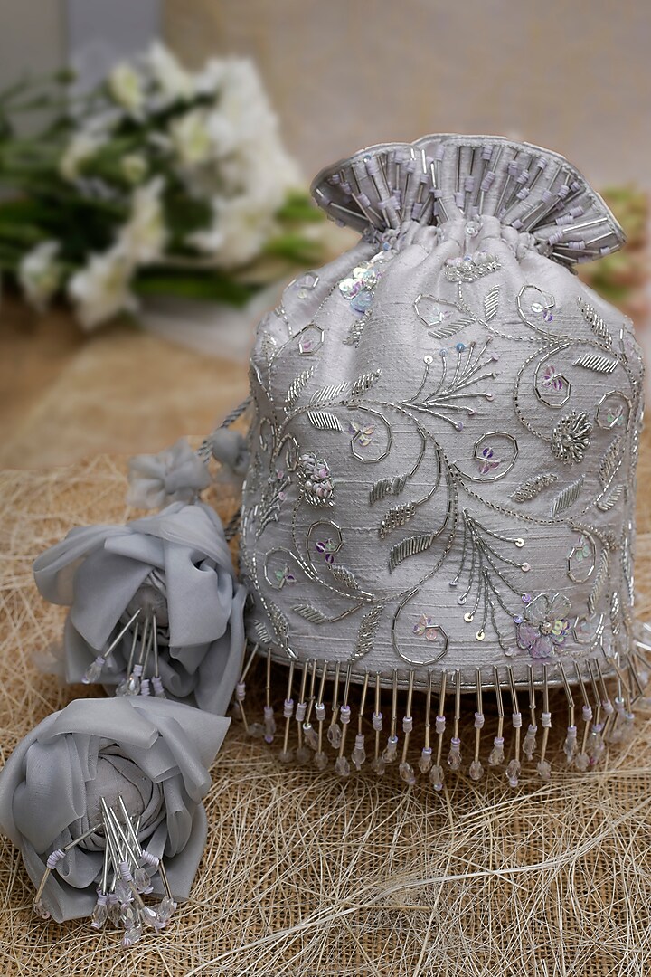 Silver Embroidered Potli With Floral Tassels by Vareli Bafna Designs at Pernia's Pop Up Shop