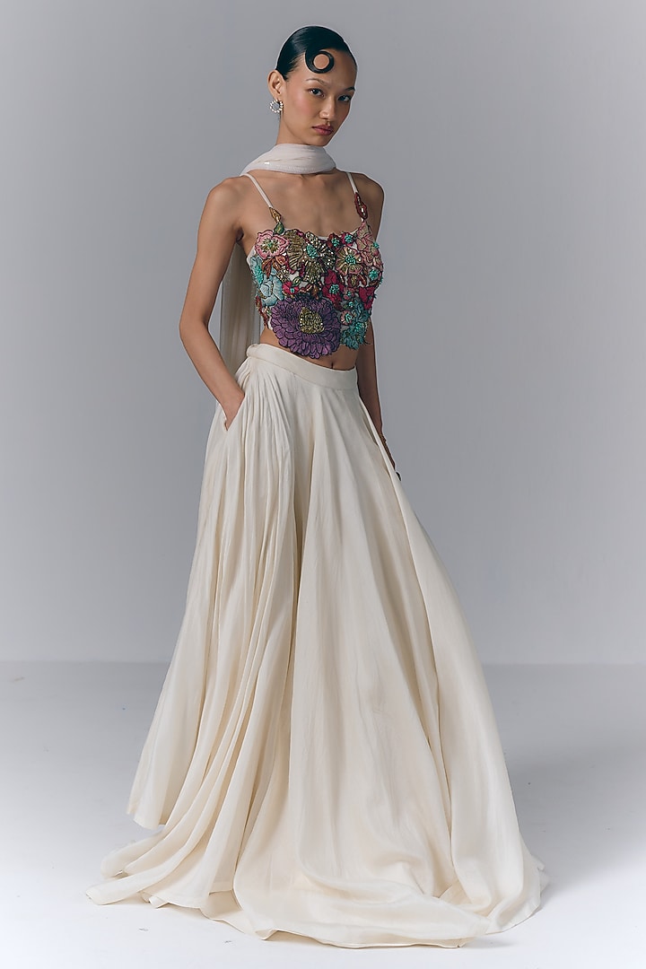 Ivory Net & Chanderi Floral Embroidered Asymmetrical Skirt Set by Varun Bahl at Pernia's Pop Up Shop
