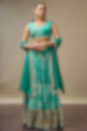 Turquoise Raw Silk Printed & Embroidered Wedding Lehenga Set by Vidhi By A La Mode at Pernia's Pop Up Shop