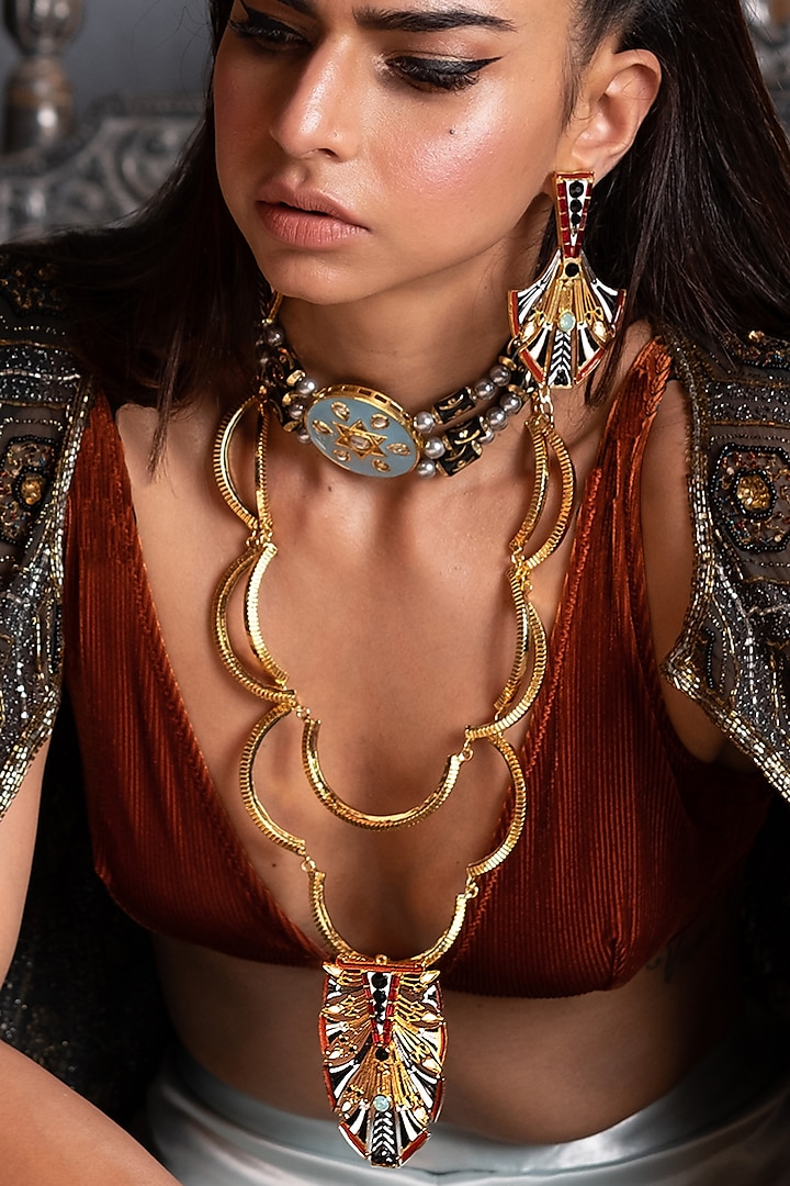 Gold Plated Swarovski Crystals Egyptian Feather Earrings by Valliyan By Nitya Arora